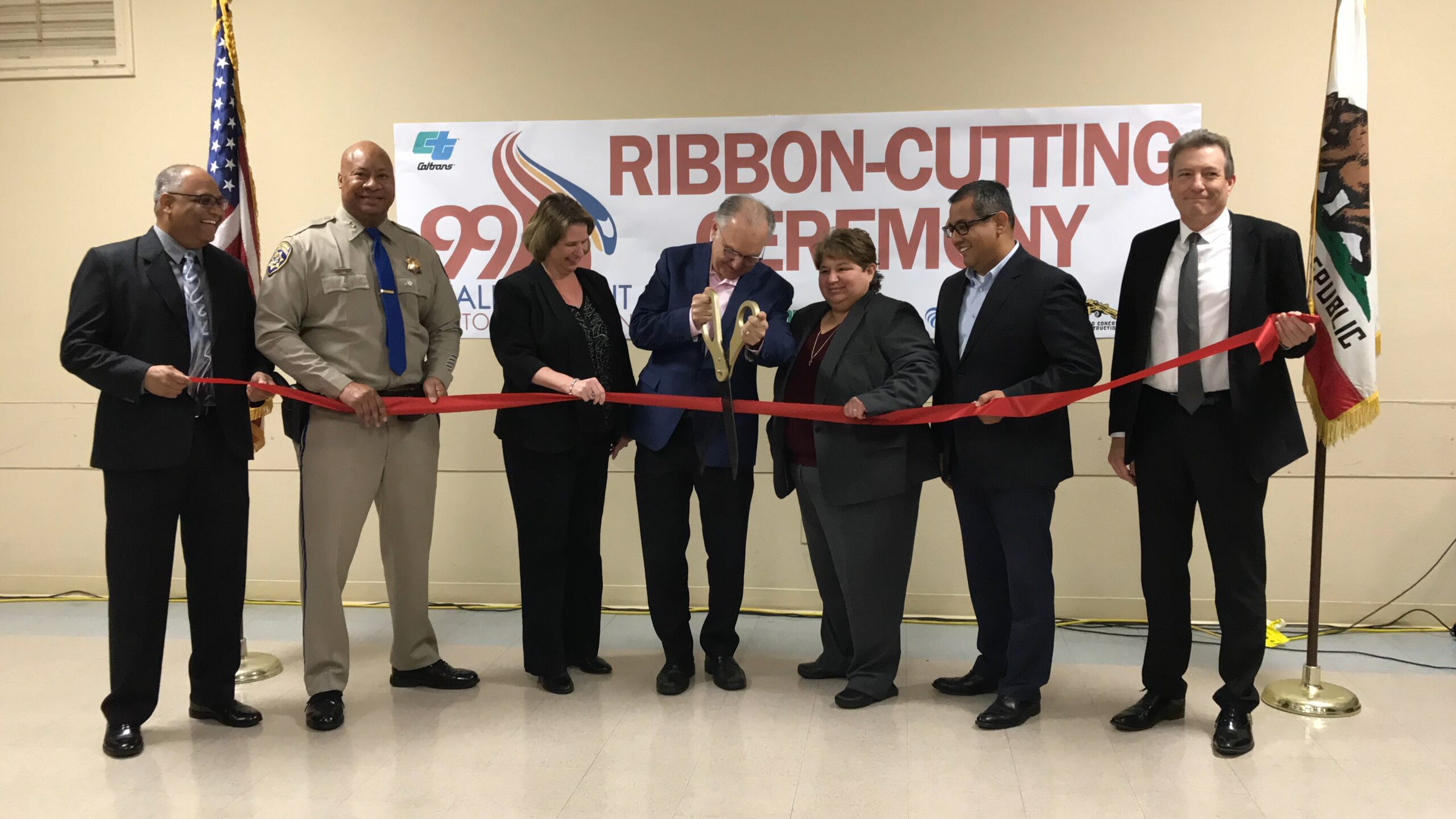 Ribbon-cutting ceremony for the completion of the 99 Realignment.