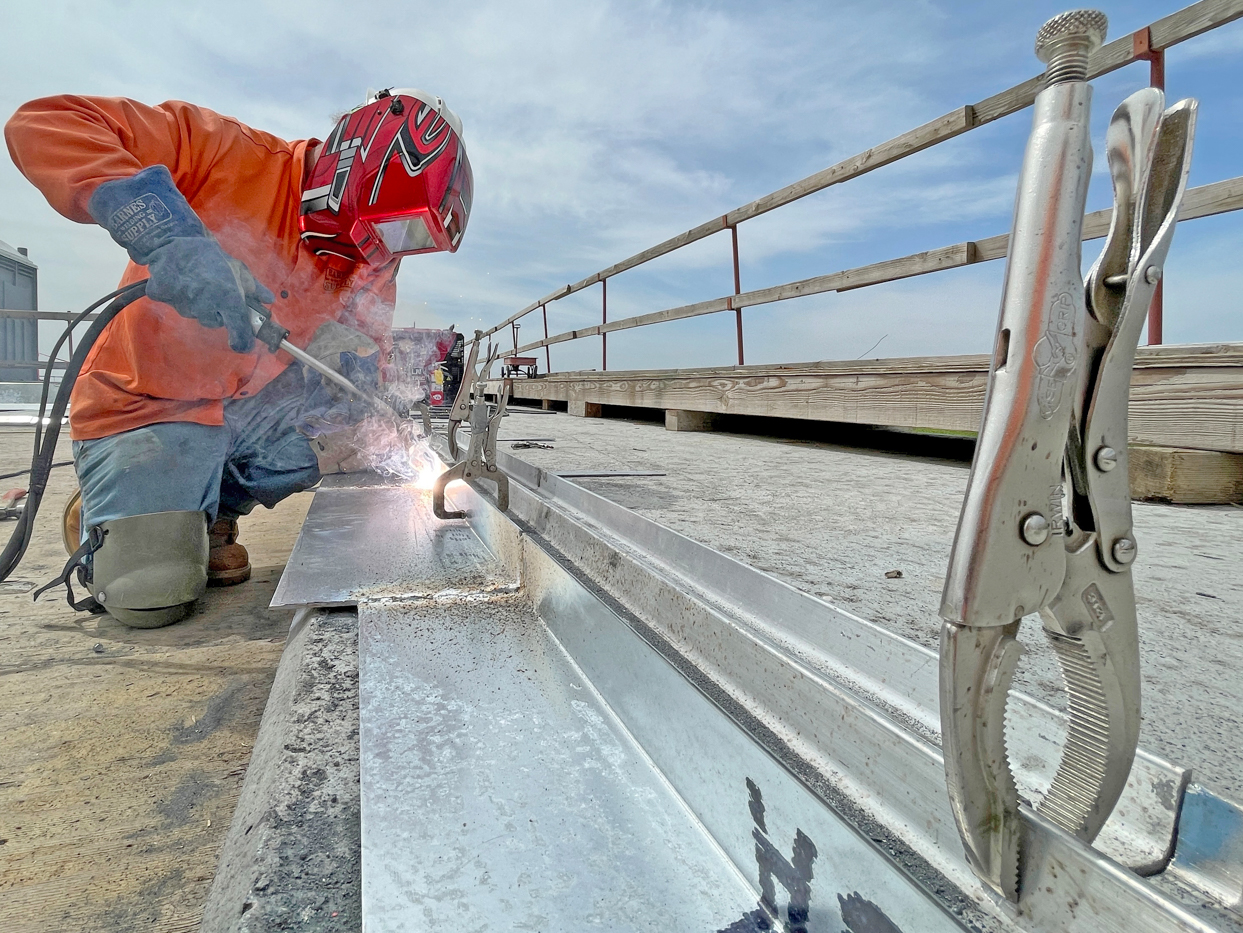 Shane Pelkey, Master Welder, at work on the Conejo Viaduct.
